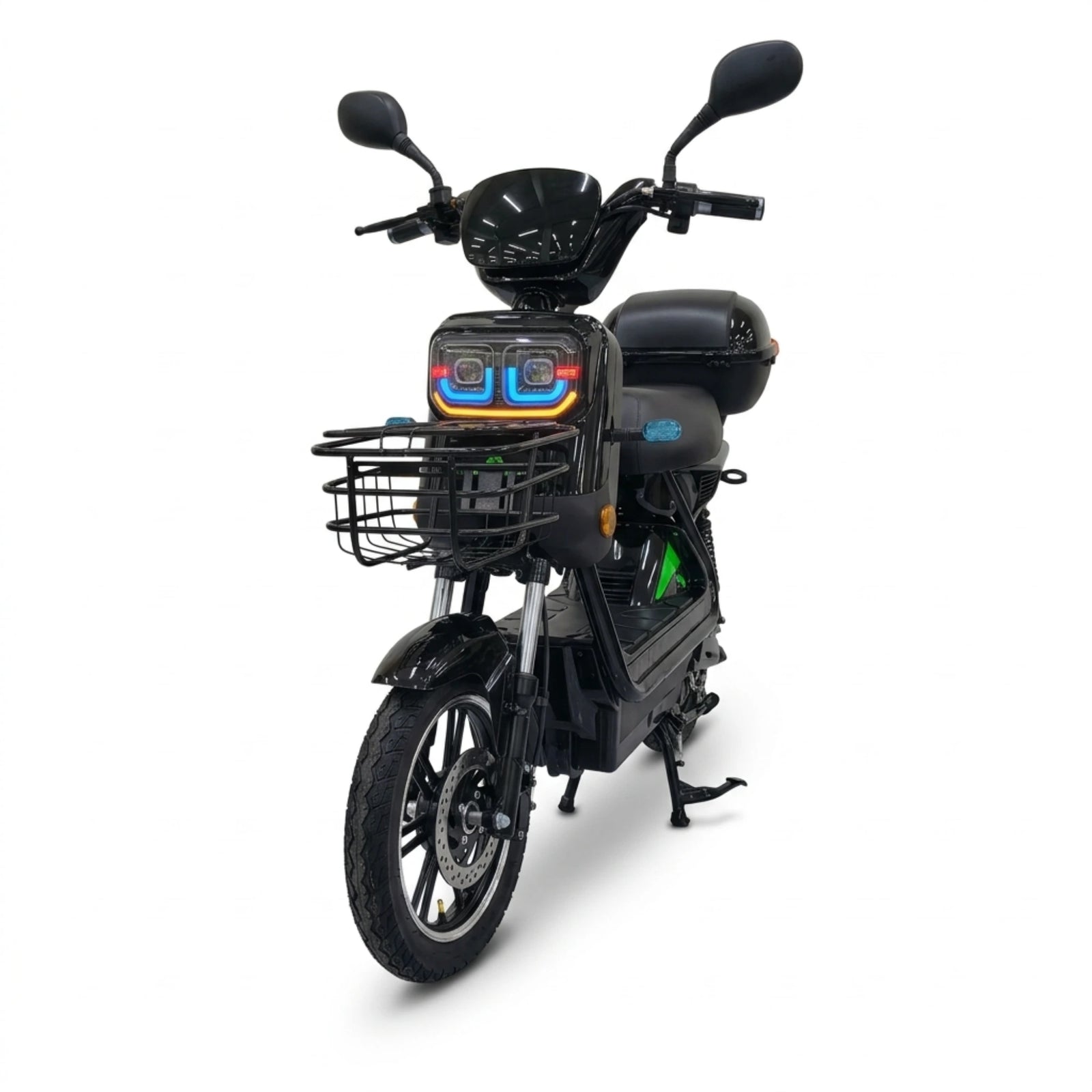 Black seated electric bike with front basket and rear storage box – front angled view with illuminated headlights