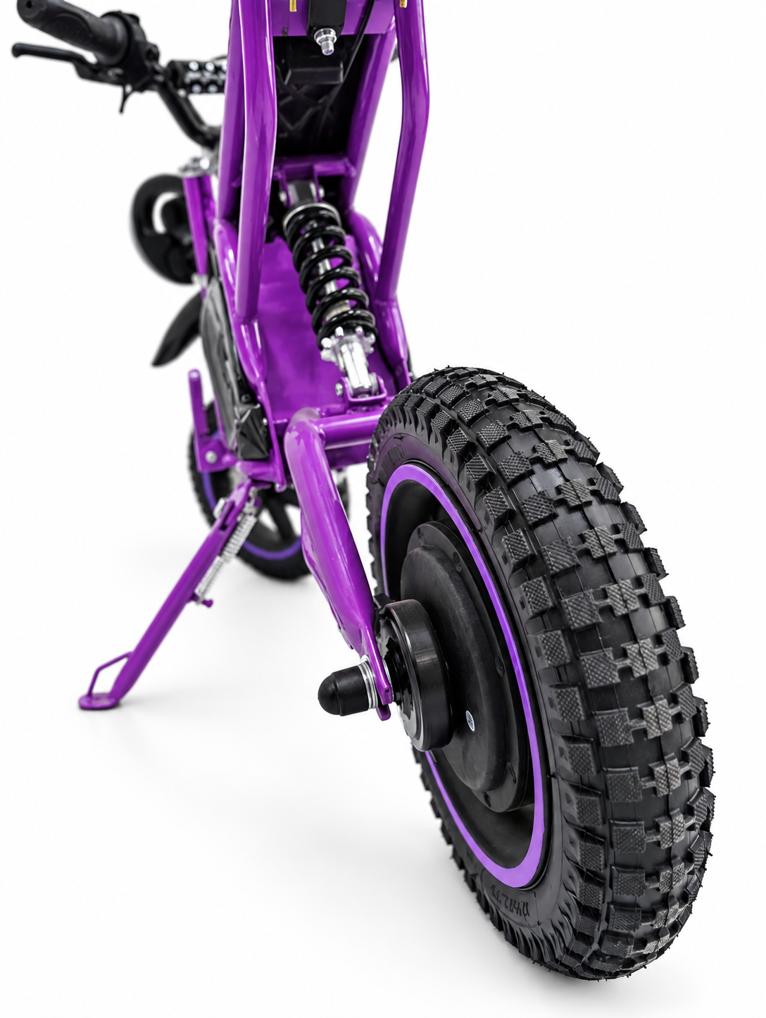 Purple Kids Mini Electric Dirt Bike – Rear wheel and suspension close-up